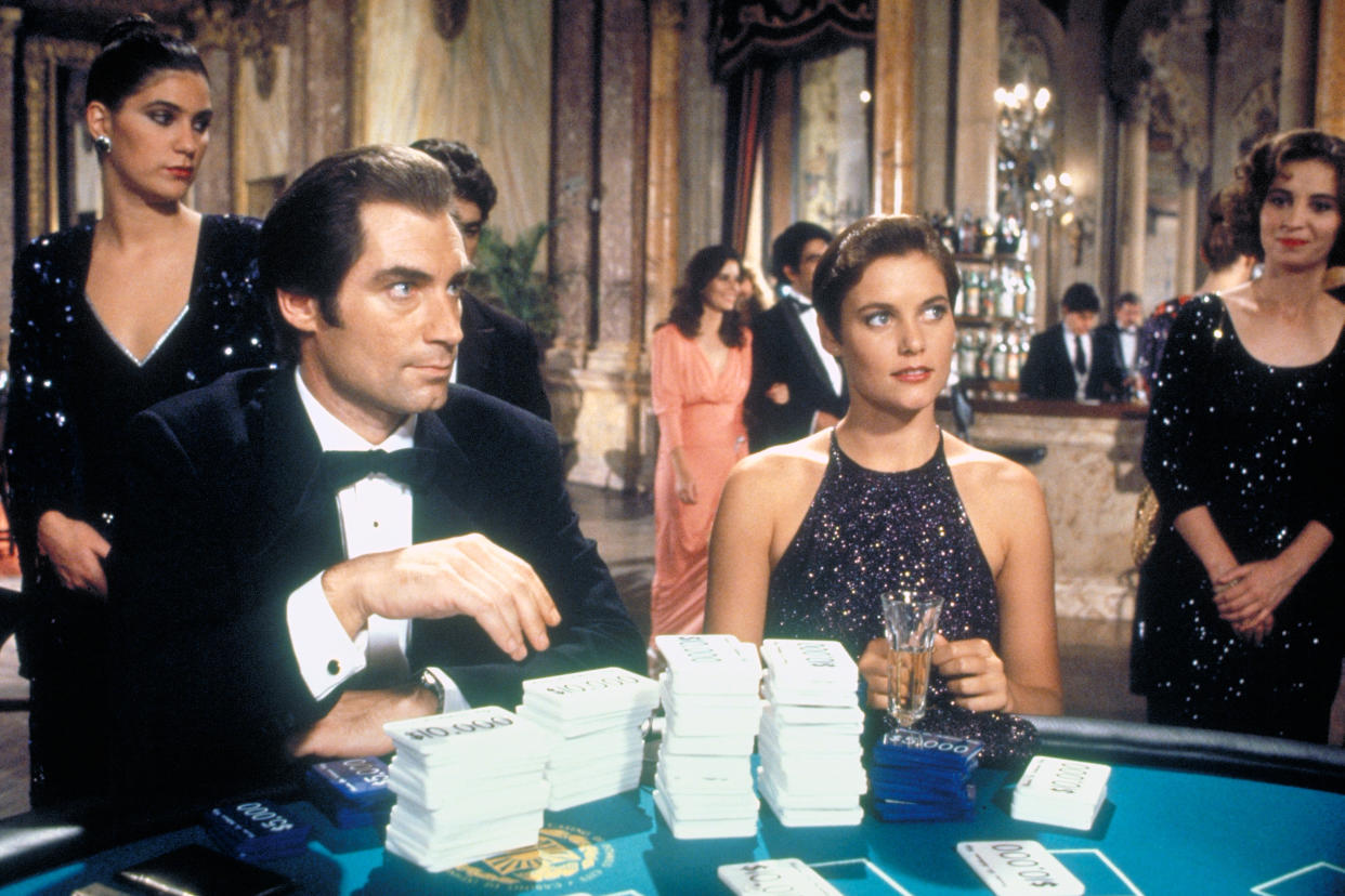 British actor Timothy Dalton and American actress Carey Lowell on the set of Licence to Kill, directed by John Glen. (Photo by Sunset Boulevard/Corbis via Getty Images)