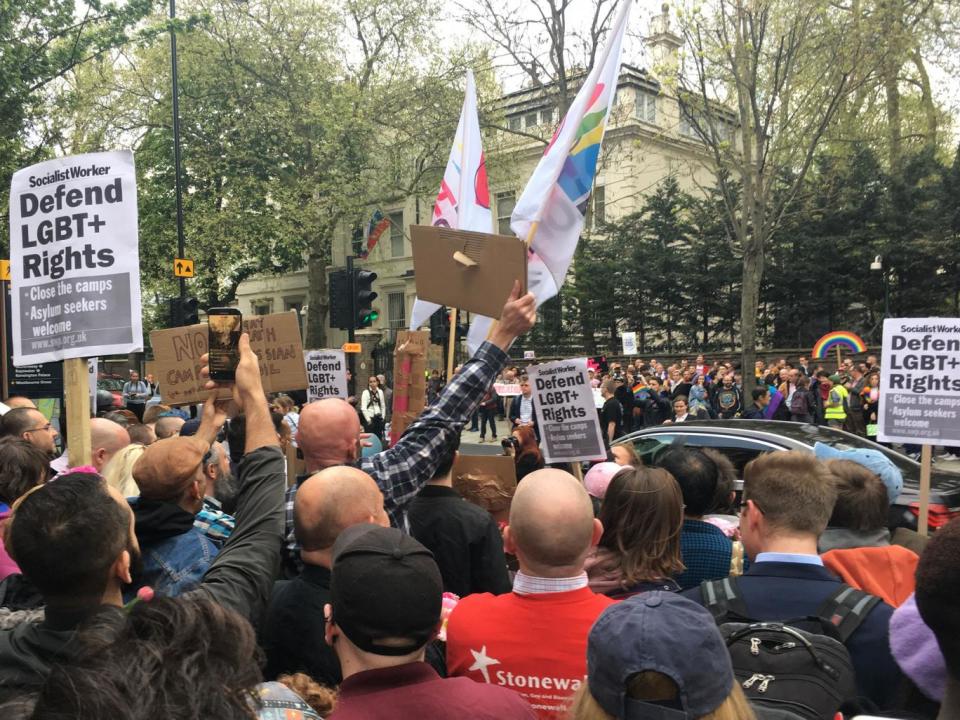 People hold a protest outside Russian Embassy in London, following reports of the torture and murder of gay men in Chechnya on 12 April (Josh Withey)
