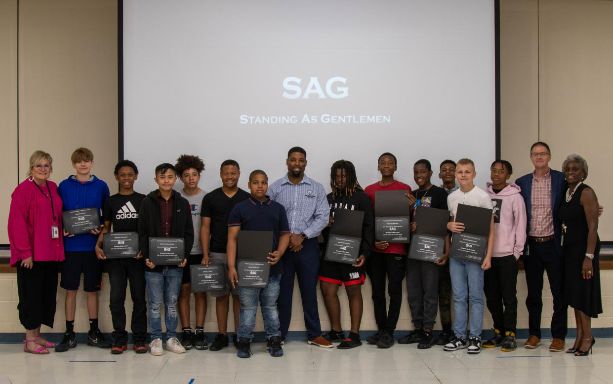 The first class of "Standing as Gentlemen", receive their awards after completing a 12-week course, at Klondike Middle School, on May 25, 2022, in West Lafayette.