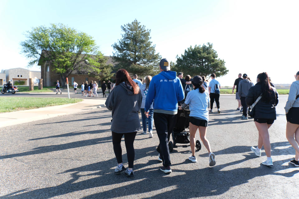 Participants start the first leg of the "Walk a Mile in Their Shoes,” a one-mile run/walk event at The Bridge Children's Advocacy Center in Amarillo on Saturday.