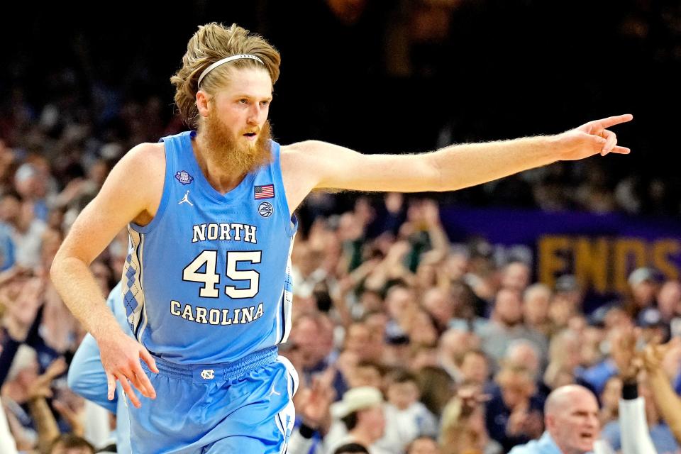 North Carolina forward Brady Manek reacts after hitting a 3-pointer against Duke during the Final Four at Caesars Superdome in New Orleans.