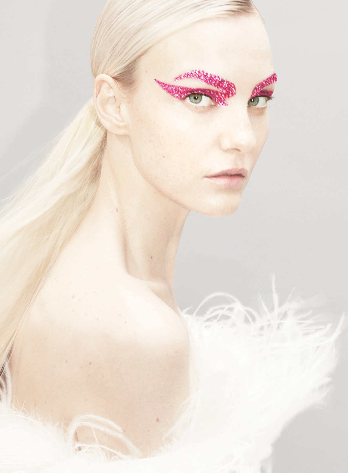 Model Caroline Trentini takes a page out of the Gen Z style guide in a crystal-encrusted eye by makeup artist Pat McGrath for Pat McGrath Labs and a Saint Laurent by Anthony Vaccarello dress. Hair, Jimmy Paul. Fashion Editor: Jorden Bickham.