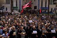 Hezbollah supporters chant slogans as they hold copies of the Quran and portraits of slain Iran's Quds force General Qassem Soleimani, during a rally after Friday prayers in the southern Beirut suburb of Dahiyeh, Lebanon, Friday, July 21, 2023. Muslim-majority nations expressed outrage Friday at the desecration of the Islamic holy book in Sweden. Following midday prayers, thousands took to the streets to show their anger, in some cases answering the call of religious and political leaders. (AP Photo/Bilal Hussein)