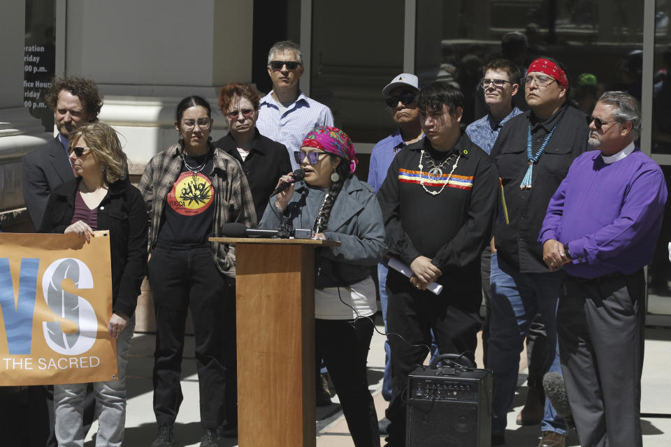 Krystal Curley, executive director of the women's environmental advocacy group Indigenous Lifeways, speaks about pollution from oil and natural gas development and frustration with New Mexico's oversight of the energy industry outside the state First District Court in Santa Fe, N.M., on Wednesday, May 10, 2023. The nation's No. 2 oil-producing state is being sued on allegations that it failed to meet constitutional provisions meant to protect against pollution from the industry. Plaintiffs include Native American residents of oil-producing regions of New Mexico. (AP Photo/Morgan Lee)