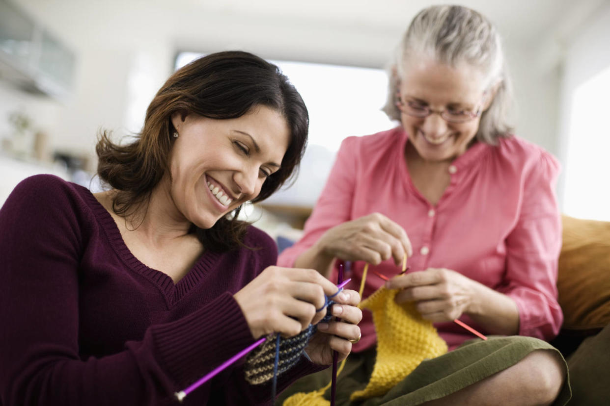 mom and daughter knitting (Getty Images)
