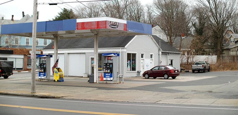 The gas station and garage at 1441 Commercial St. in Lower Jackson Square in Weymouth is being considered for a four-story apartment building.