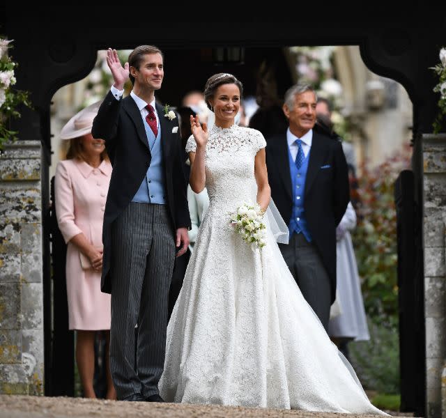 Pippa Middleton and her new husband James Matthews leave St Mark’s Church in Englefield, west of London, on May 20, 2017 following their wedding ceremony. After turning heads at her sister Kate’s wedding to Prince William, Pippa Middleton graduated from bridesmaid to bride on Saturday at a star-studded wedding in an English country church. Middleton, married financier James Matthews, 41, at a ceremony attended by the royal couple and tennis star Roger Federer, as she wore a couture dress by British designer Giles Deacon. / AFP PHOTO / POOL AND AFP PHOTO / Justin TALLIS (Photo credit should read JUSTIN TALLIS/AFP via Getty Images)