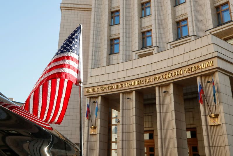 FILE PHOTO: A car of the U.S. delegation is parked in front of the headquarters of the Russian Foreign Ministry in Moscow