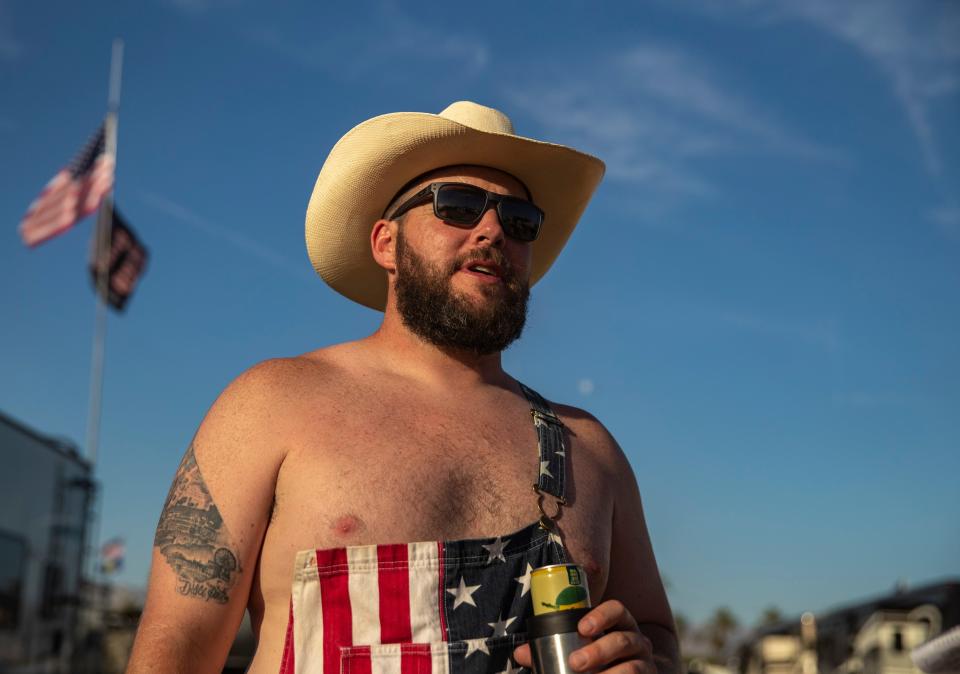 Ben Duncan of Corona, a Stagecoach veteran returning for his 12th time, talks about his experiences over the years while standing at his camp in The Resort camping area at Stagecoach at the Empire Polo Club in Indio, Calif., Saturday, April 29, 2023. "My girlfriend always jokes ÔweÕre not coming next yearÕ because of the dust and the heat, but we always come back," Duncan explains. "We have to come. This is CaliforniaÕs country. This is where I celebrate my birthday. This is vacation!" 