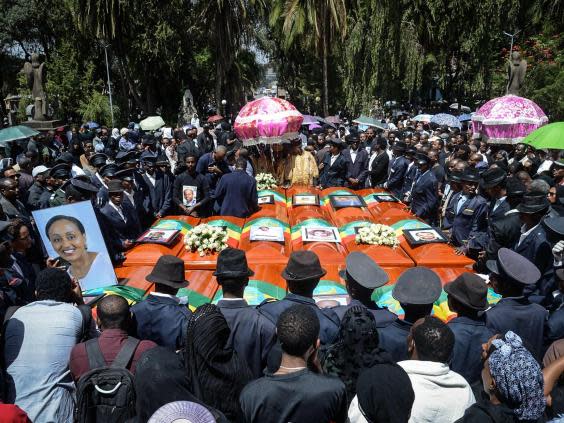 Ethiopian Airlines crash: Victims' relatives 'given bags of earth to bury' in place of bodies during mass funeral