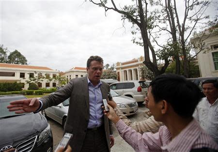 Russian tycoon Sergei Polonsky speaks to the media at the Appeal Court in central Phnom Penh January 13, 2014. REUTERS/Samrang Pring