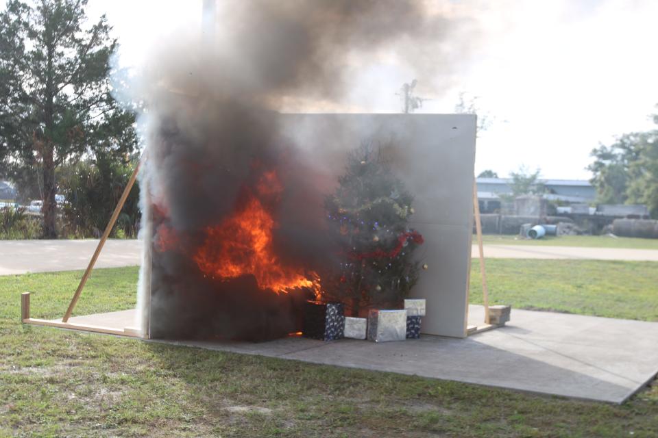 Panama City firefighters set a live Christmas tree on fire this week to show what can happen if a tree catches fire inside a home.
