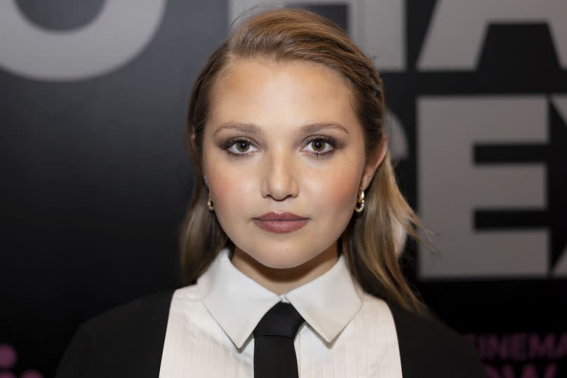 Mia McKenna-Bruce poses for photographers upon arrival for the special screening of the film 'How to Have Sex' on Friday, Nov. 3, 2023 in London.