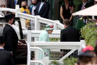 <p>The crowd erupted in a huge cheer upon their first sighting of the monarch.</p>