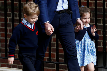 FILE PHOTO: Britain's Prince William arrives at St Mary's Hospital with his children Prince George and Princess Charlotte in London, April 23, 2018. REUTERS/Henry Nicholls -/File Photo