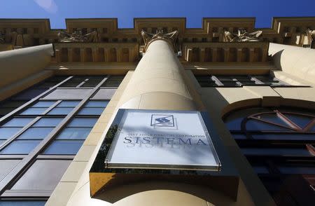 The logo of Sistema JSFC is seen on its headquarters building in Moscow, September 17, 2014. REUTERS/Maxim Shemetov