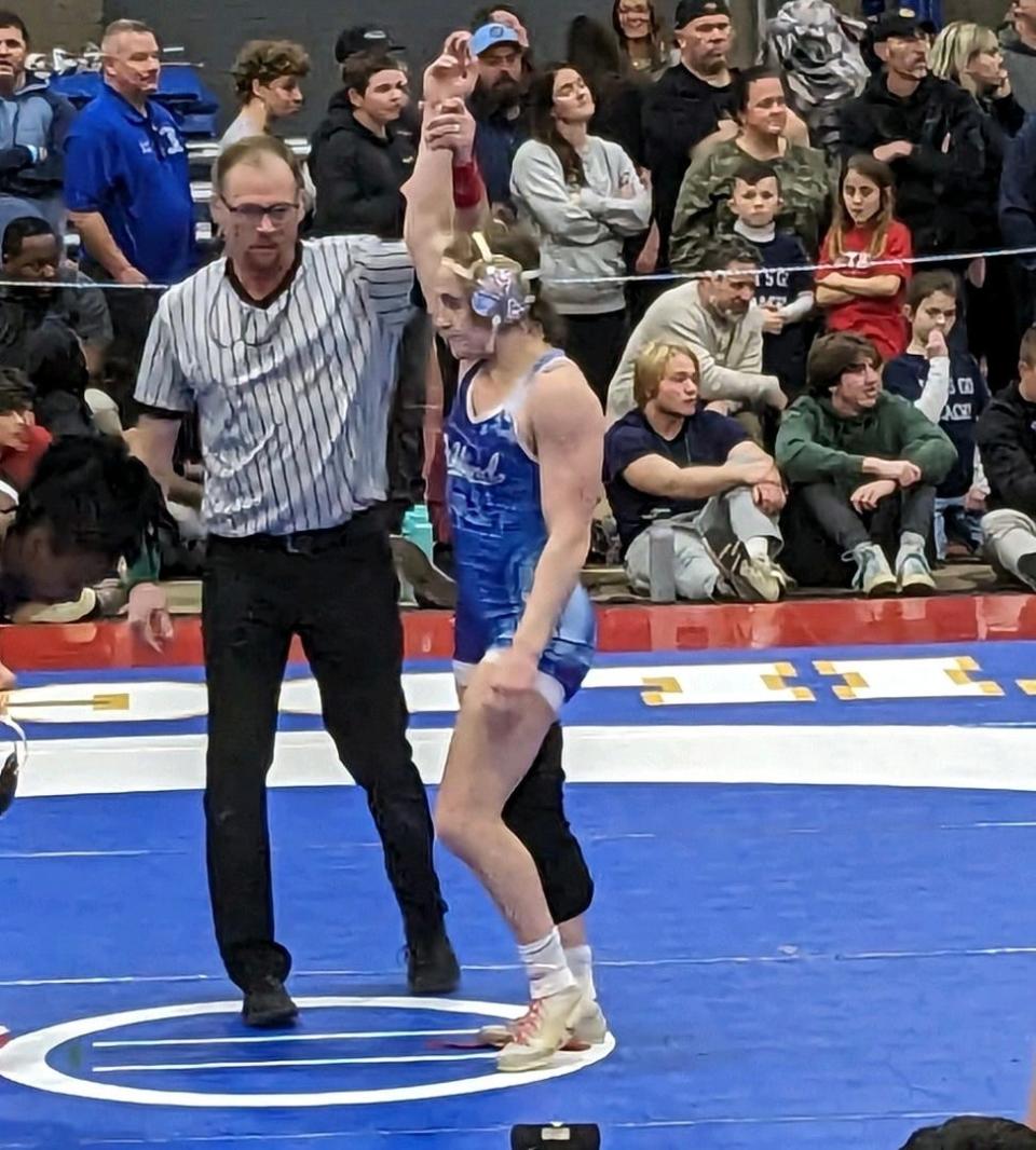 Ashland's Nora Quitt is crowned the champion at 138 pounds at the New England wrestling championships in Providence, Rhode Island, on Saturday, March 2, 2024