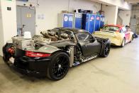 <p>The first prototypes for <a rel="nofollow noopener" href="https://www.roadandtrack.com/new-cars/road-tests/reviews/a6184/5-things-i-learned-porsche-918-spyder/" target="_blank" data-ylk="slk:Porsche's 918 hypercar;elm:context_link;itc:0;sec:content-canvas" class="link ">Porsche's 918 hypercar</a> wore no bodywork from the passenger cell back, save for a 911 bumper with 911 taillights. The engine, as well as those supercool upward-facing exhaust exits, are in plain view for all to enjoy. </p>
