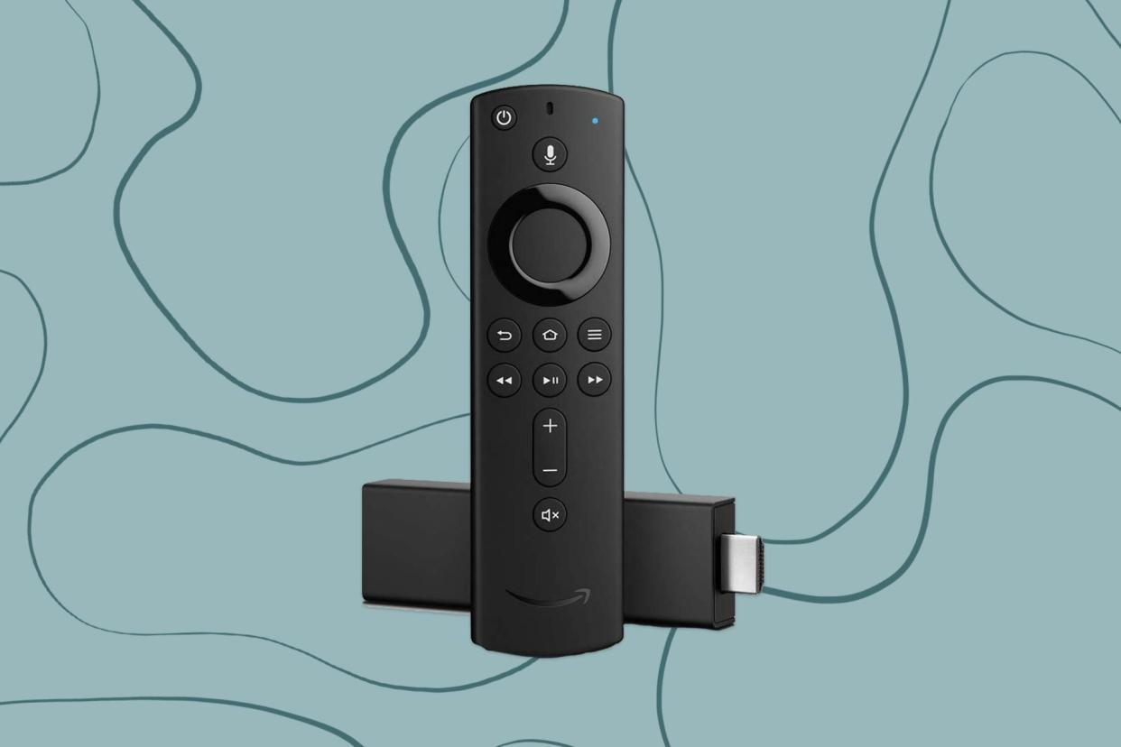 Black TV remote and media stick