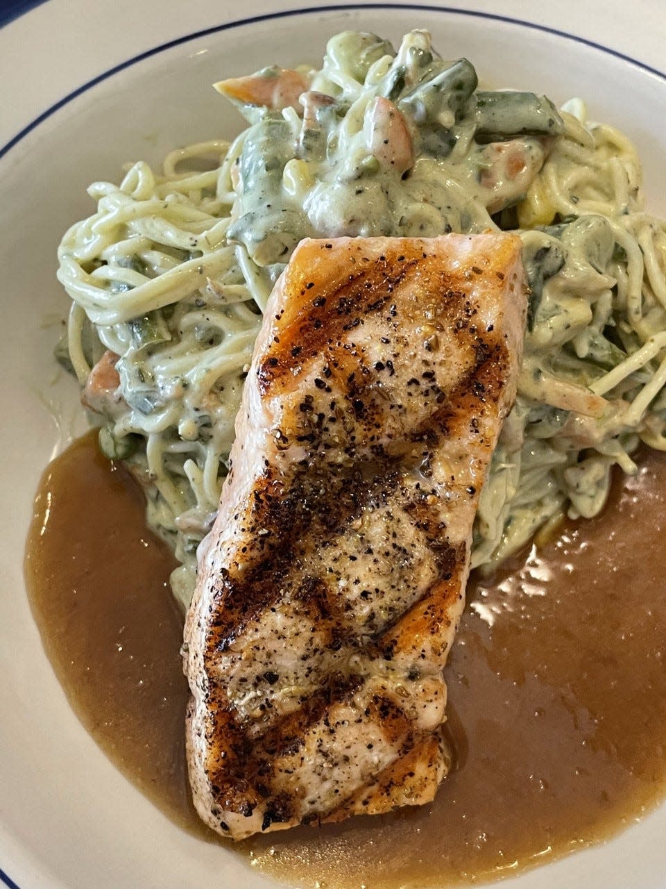 Salmon with angel hair carbonara at Trattoria Roma