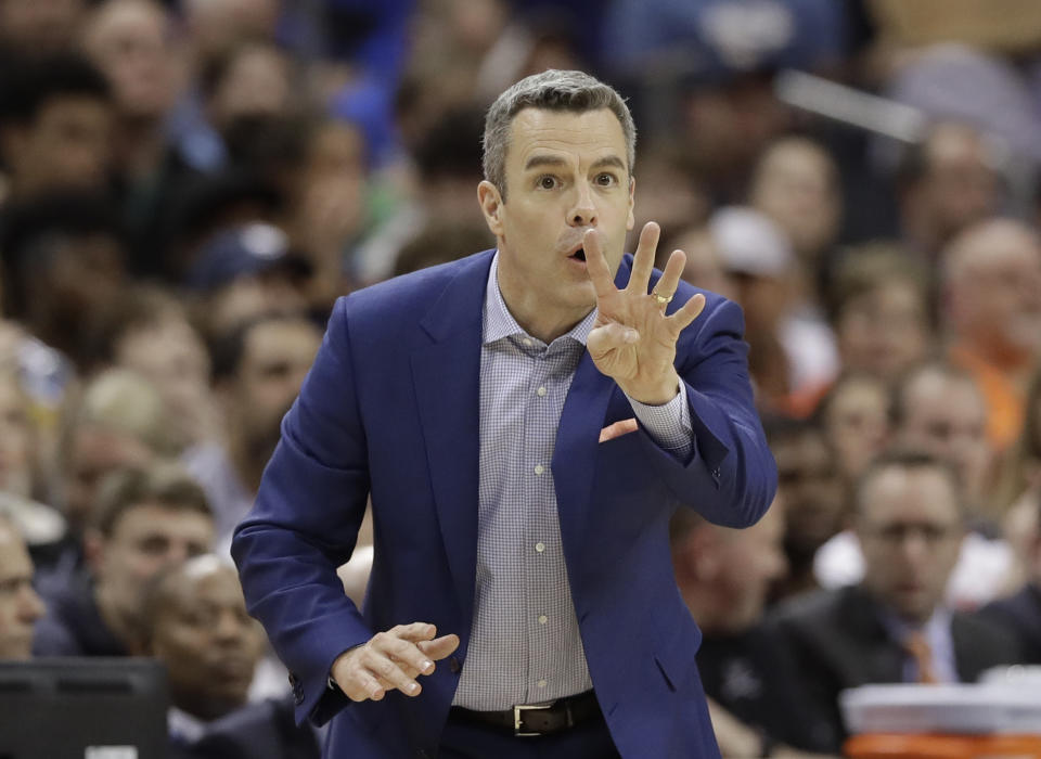 Virginia coach Tony Bennett argues a call during the second half of an NCAA college basketball game against Florida State in the Atlantic Coast Conference tournament in Charlotte, N.C., Friday, March 15, 2019. (AP Photo/Chuck Burton)