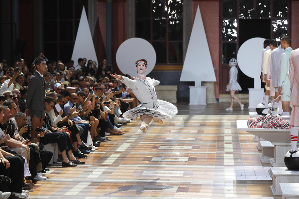 A dancer performs at the Thom Browne mens Spring-Summer 2020 fashion collection presented in Paris, Saturday, June 22 2019. (AP Photo/Michel Euler)