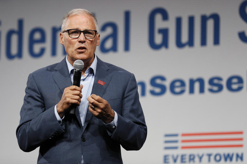 FILE - In this Aug. 10, 2019, file photo, Democratic presidential candidate Washington Gov. Jay Inslee speaks at the Presidential Gun Sense Forum in Des Moines, Iowa. Inslee, who made fighting climate change the central theme of his presidential campaign, announced Wednesday night, Aug. 21, that he is ending his bid for the 2020 Democratic nomination. (AP Photo/Charlie Neibergall, File)