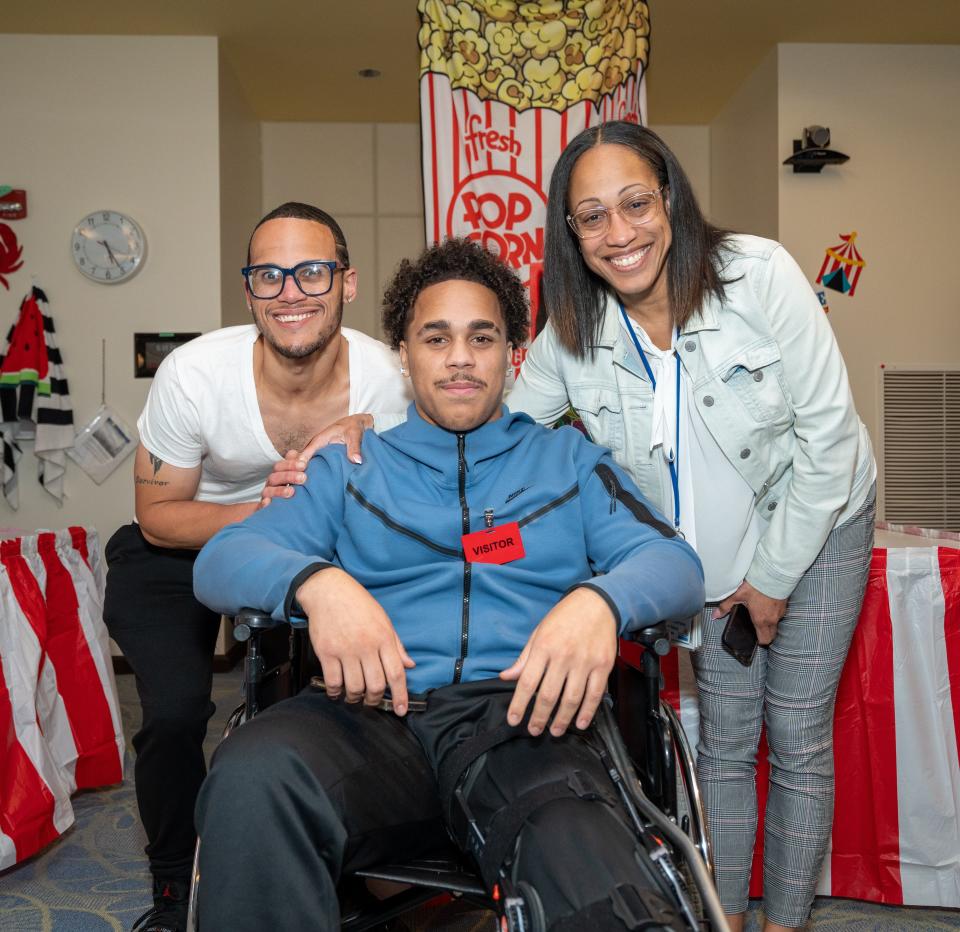 From left to right: Khalil, Katrell and Shanette Pereira visited the PSE&G Children's Specialized Hospital in New Brunswick