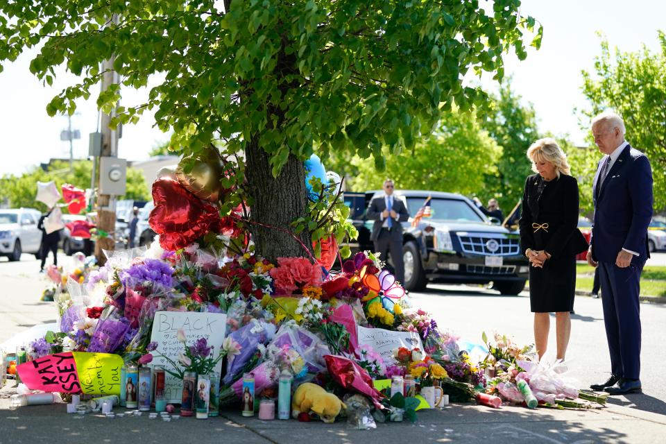 President Joe Biden and first lady Jill Biden visit the scene of a shooting at a supermarket to pay respects and speak to families of the victims of a May 14 shooting in Buffalo, N.Y.