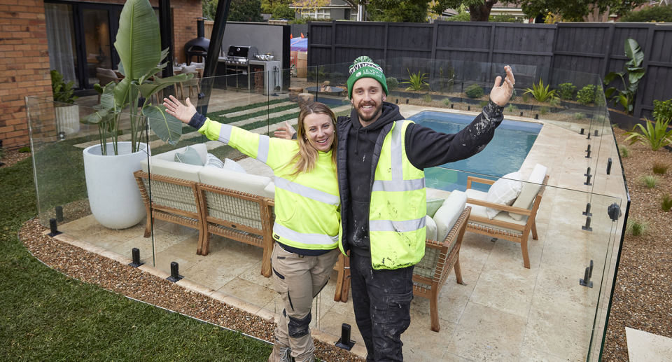 The Block's Kristy and Brett standing in their backyard.