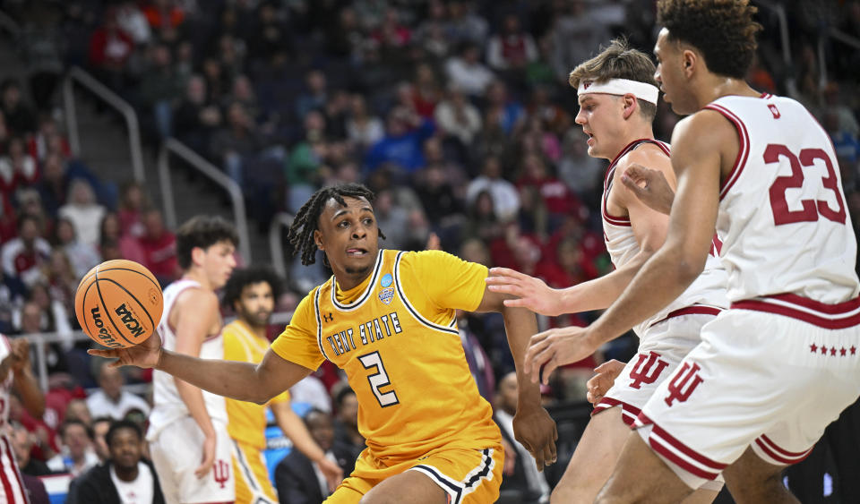 Kent State guard Malique Jacobs (2) move the ball against Indiana during the first half of a first-round college basketball game in the NCAA Tournament Friday, March 17, 2023, in Albany, N.Y. (AP Photo/Hans Pennink)