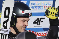Canada's James Crawford celebrates in the finish area after completing an alpine ski, men's World Championship super-G race, in Courchevel, France, Thursday, Feb. 9, 2023. (AP Photo/Marco Trovati)