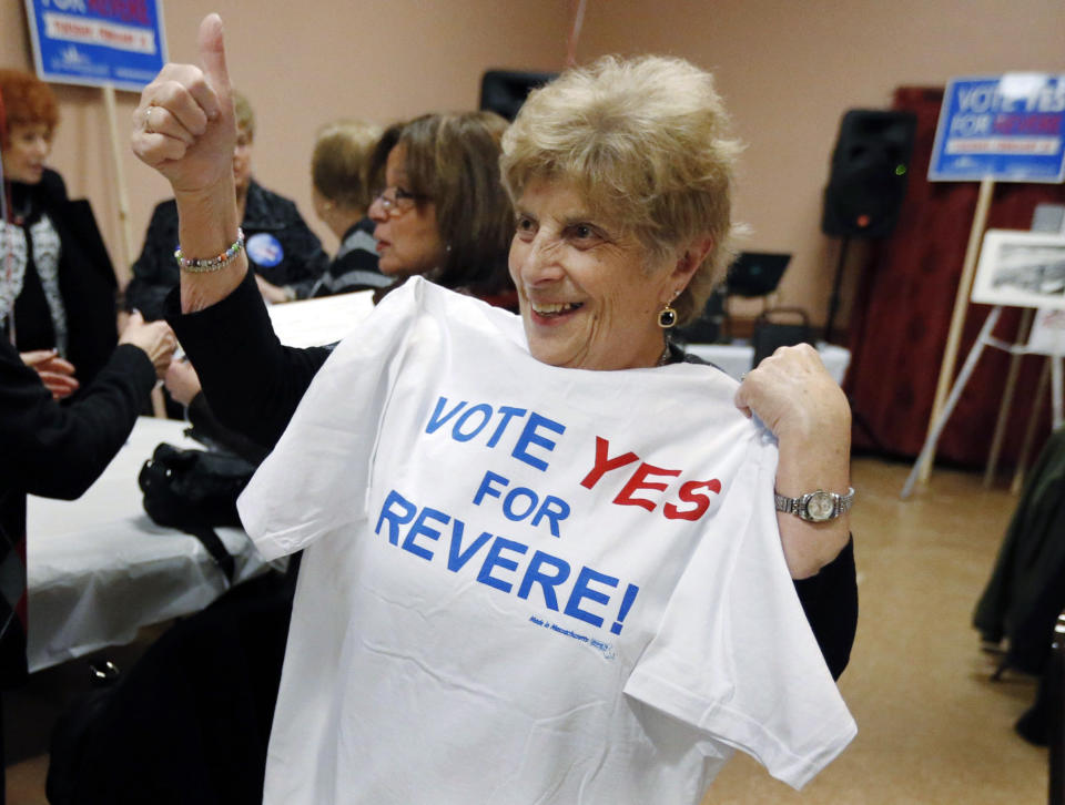 FILE - In this Feb. 23, 2014 file photo, Rose Mirasole gives a thumbs-up during a pro-casino rally two days before voters approved a proposal by Mohegan Sun to build a resort casino on land owned by Suffolk Downs in Revere, Mass. A gaming slump is eating into the profits of the Mohegan Sun casino in Uncasville, Conn., in 2014. But the 2,000 tribal members who draw benefits from the massive casino are not feeling the pinch. The tribe’s gaming company has begun running casinos in Pennsylvania and Atlantic City, and it is pursuing more projects in states including Washington, New York, and Massachusetts. (AP Photo/Michael Dwyer, File)