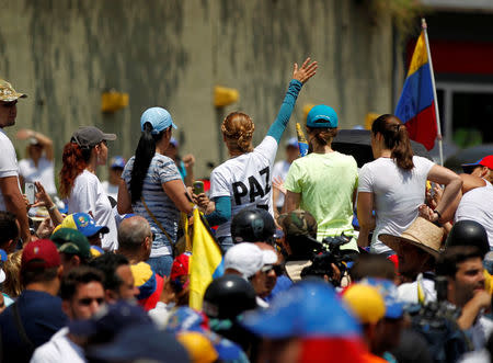 Lilian Tintori, wife of jailed opposition leader Leopoldo Lopez, addresses supporters during a rally against Venezuela's President Nicolas Maduro in Caracas, Venezuela, April 20, 2017. REUTERS/Christian Veron