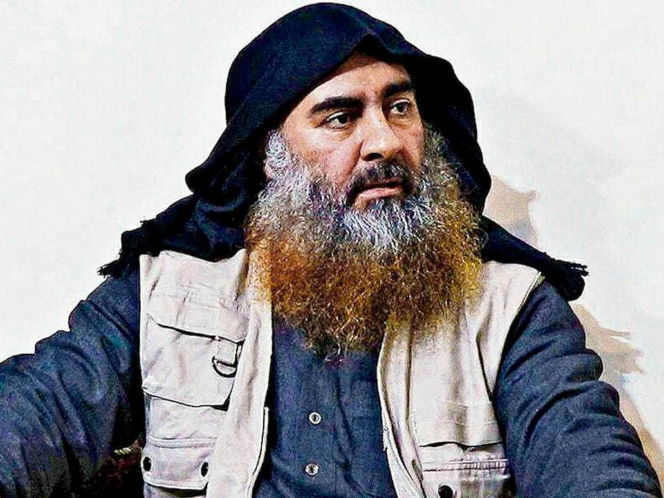 FILE - This file image released by the Department of Defense on Wednesday, Oct. 30, 2019, and displayed at a Pentagon briefing, shows an image of Islamic State leader Abu Bakr al-Baghdadi. The Islamic State group seemed largely defeated last year, with the loss of its territory, the killing of its founder in a U.S. raid and an unprecedented crackdown on its social media propaganda machine but tensions between the U.S. and Iran in the region provide a comeback opportunity for the extremist group. (Department of Defense via AP, File)