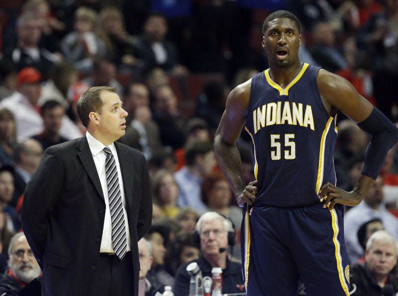 Indiana Pacers head coach Frank Vogel, left, talks to center Roy Hibbert during the first half of an NBA basketball game against the Chicago Bulls in Chicago on Wednesday, March 18, 2015. (AP Photo/Nam Y. Huh)