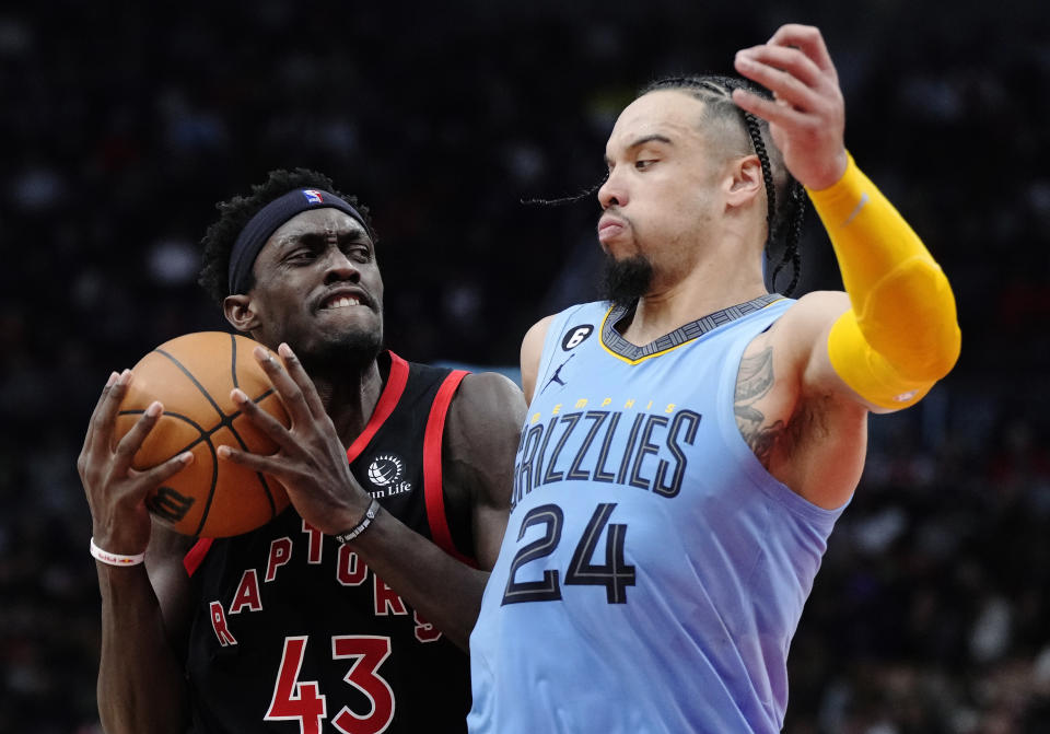 Toronto Raptors forward Pascal Siakam (43) drives against Memphis Grizzlies forward Dillon Brooks (24) during the second half of an NBA basketball game Thursday, Dec. 29, 2022, in Toronto. (Frank Gunn/The Canadian Press via AP)