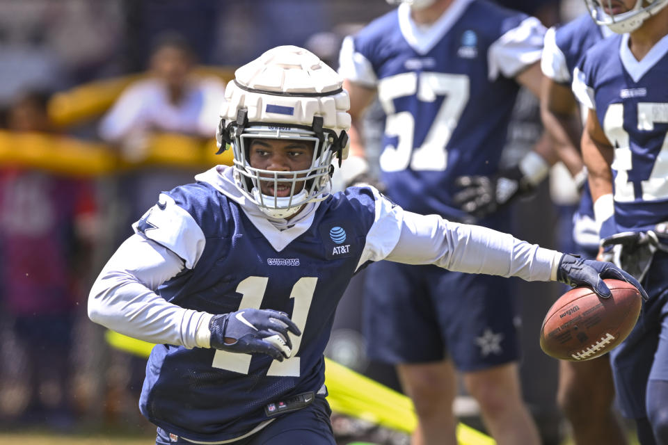 Dallas Cowboys linebacker Micah Parsons runs a drill during NFL football training camp Wednesday, July 27, 2022, in Oxnard, Calif. (AP Photo/Gus Ruelas)