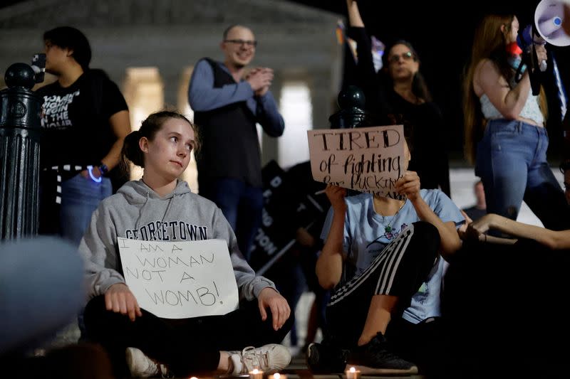 FILE PHOTO: Protesters react outside the U.S. Supreme Court after the leak of a draft opinion preparing for a majority of the court to overturn the Roe v. Wade abortion rights decision in Washington