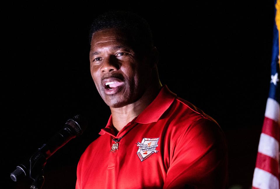 Republican Senate candidate Herschel Walker speaks to supporters.