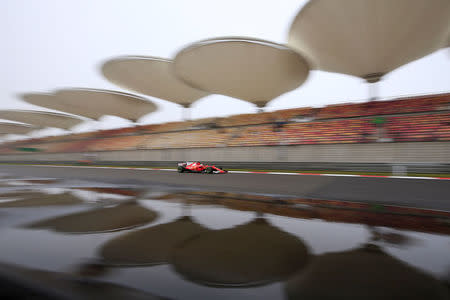 Formula One - F1 - Chinese Grand Prix - Shanghai, China - 7/4/17 - Ferrari Formula One driver Sebastian Vettel of Germany drives during the first practice session at the Shanghai International Circuit. REUTERS/Aly Song