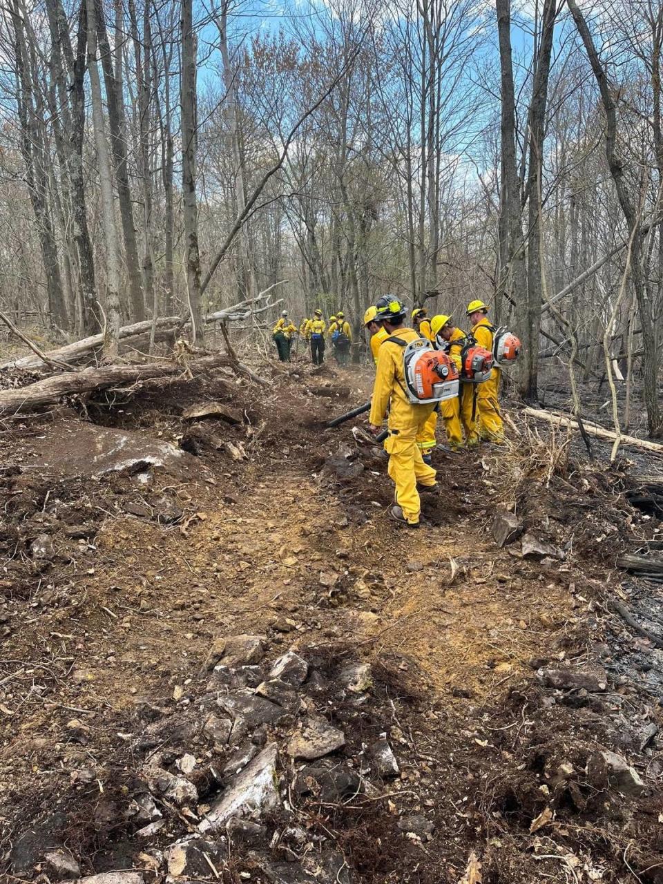 A number of fire companies from Centre, Clearfield and Blair counties battled a forest fire that burned more than 1,500 acres in Rush Township on April 20.