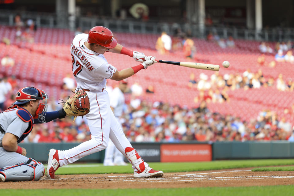 Cincinnati Reds' Tyler Stephenson hits an RBI-single during the first inning of a baseball game against the St. Louis Cardinals in Cincinnati, Monday, May 22, 2023. AP Photo/Aaron Doster)