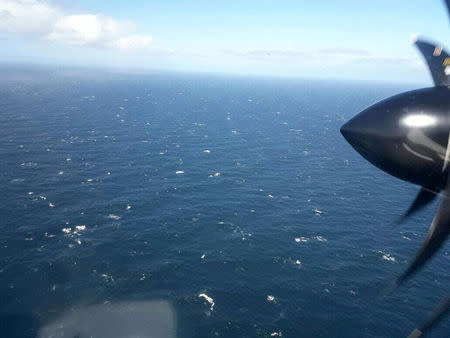 An Argentine Navy airplane is seen as it flies over the Atlantic Ocean during the search for the ARA San Juan submarine missing at sea, Argentina November 22, 2017. Argentine Navy/Handout via REUTERS ATTENTION EDITORS - THIS IMAGE WAS PROVIDED BY A THIRD PARTY.