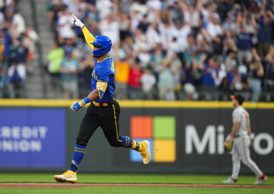 Seattle Mariners' Julio Rodríguez runs the bases on a three-run home run against the Baltimore Orioles during the fourth inning of a baseball game Friday, Aug. 11, 2023, in Seattle. (AP Photo/Lindsey Wasson)