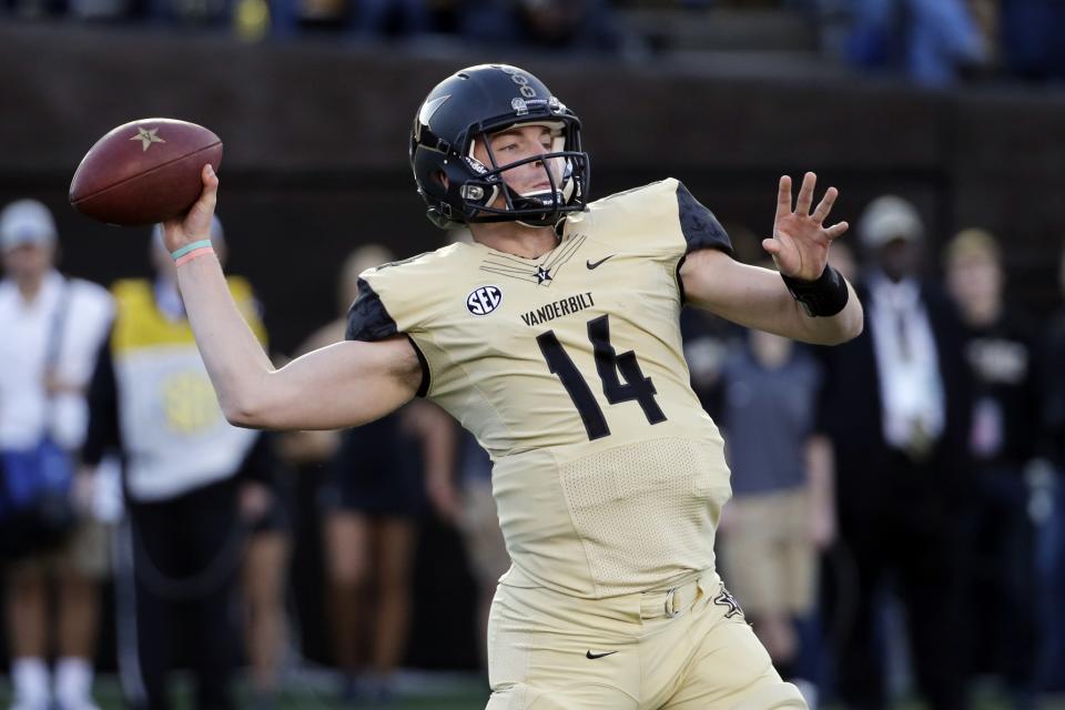 In this Nov. 14, 2015, file photo, Vanderbilt quarterback Kyle Shurmur passes against Kentucky in the first half of an NCAA college football game, in Nashville, Tenn. (AP Photo/Mark Humphrey, File)