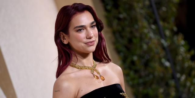 Dua Lipa wore a dress with gold and diamond bones to the Golden Globes