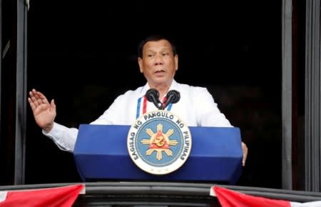 FILE PHOTO: Philippine's President Rodrigo Duterte speaks during the 120th Philippine Independence day celebration at the Emilio Aguinaldo shrine in Kawit, Cavite Philippines June 12, 2018. REUTERS/Erik De Castro/File Photo