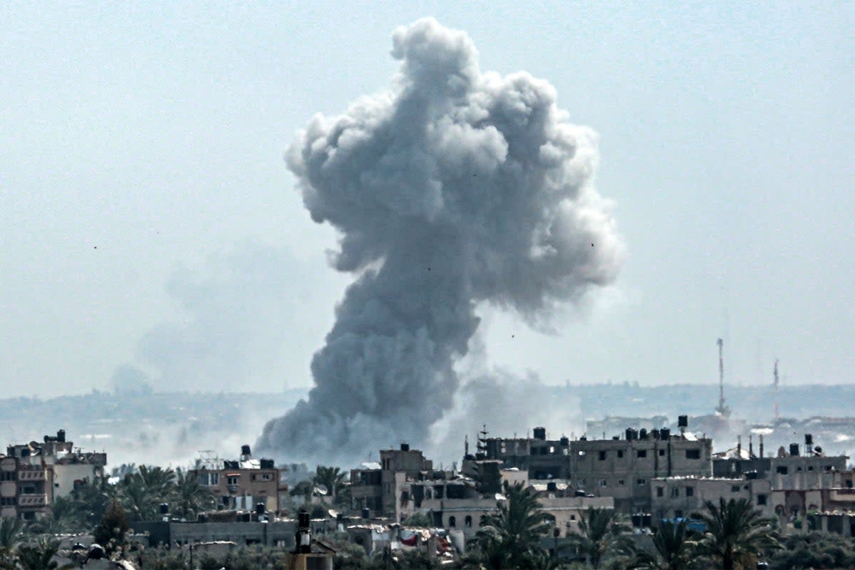 A smoke plume billows following Israeli bombardment north of Nuseirat in the central Gaza Strip (AFP/Getty)