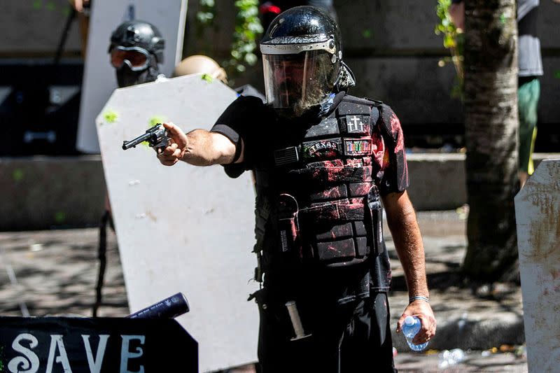 FILE PHOTO: FILE PHOTO: Protesters clash with police in Portland